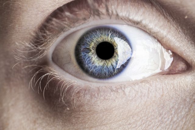 close up of woman's blue eye