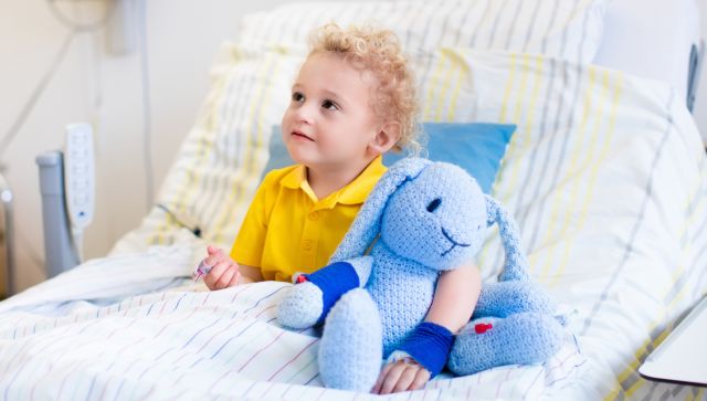 child in hospital bed