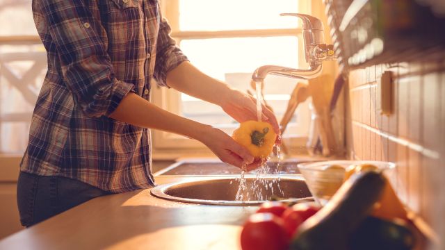 washing vegetables, yellow pepper, woman, kitchen, sink