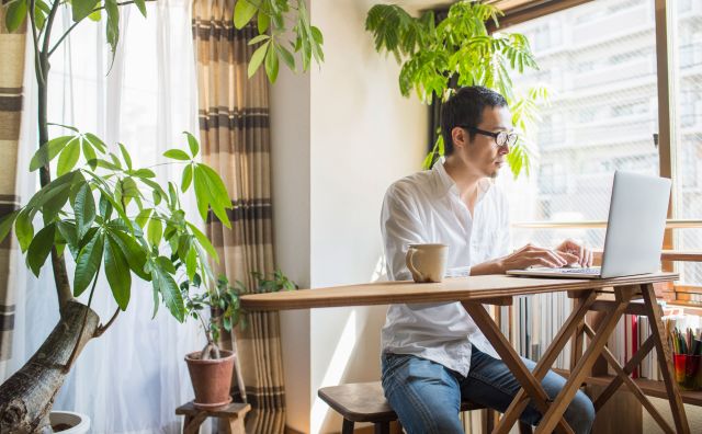 man using laptop