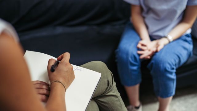 Woman talking with therapist