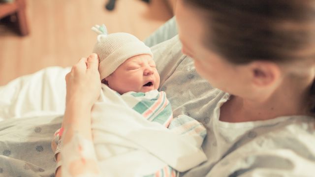 mom holding newborn