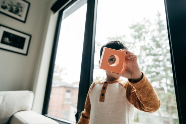 young boy with learning toy 