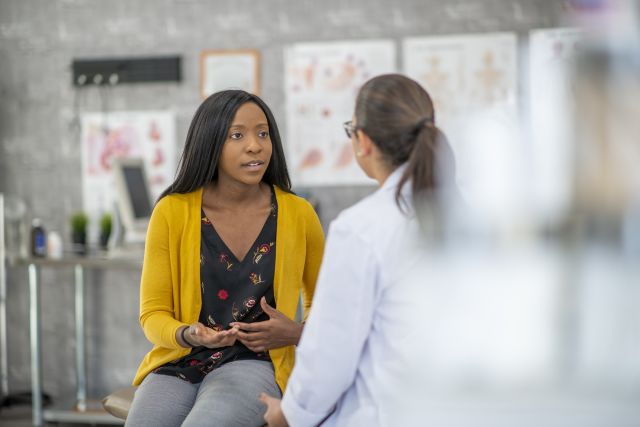 A woman speaks with a healthcare provider. She is seeking a second opinion about endometriosis. 