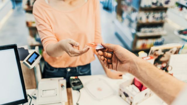 woman buying medicine