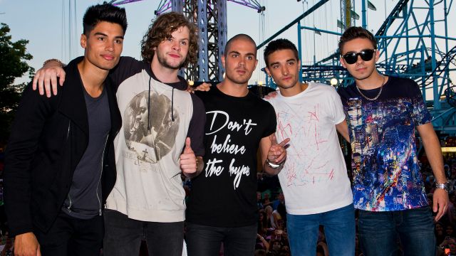 Tom Parker and his bandmates posing for a picture before his untimely passing due to a cancerous brain tumor.