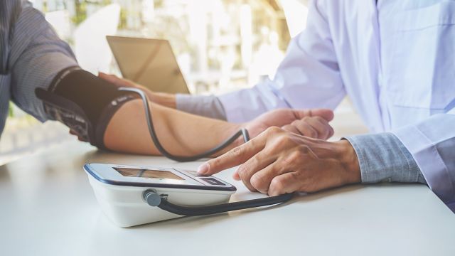 Person having their blood pressure checked.