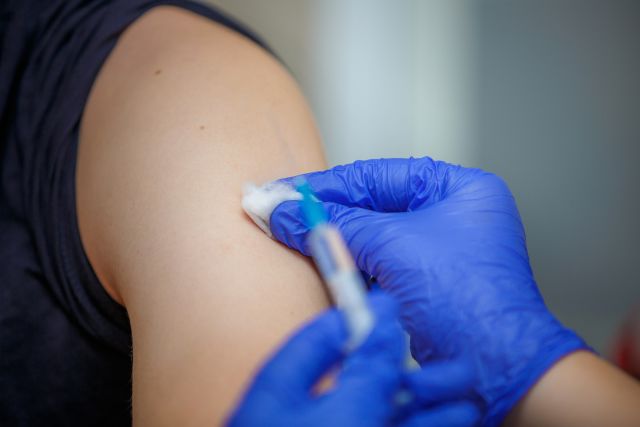 close up of vaccination in arm