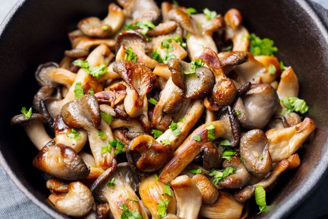 Pan full of mushrooms cooked with parsley