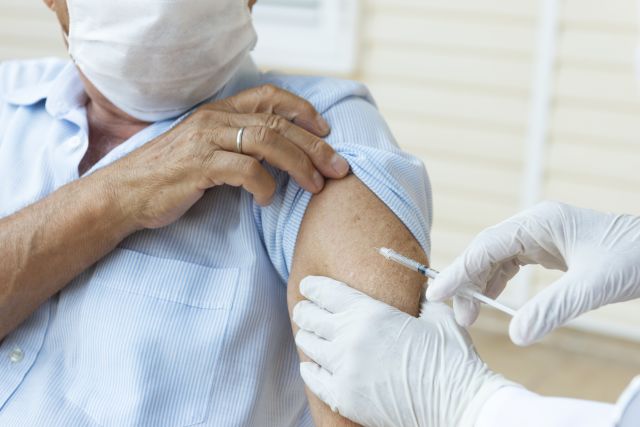 Older person getting vaccinated