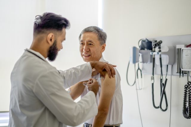 The words Get Flu Shot written on a Calendar