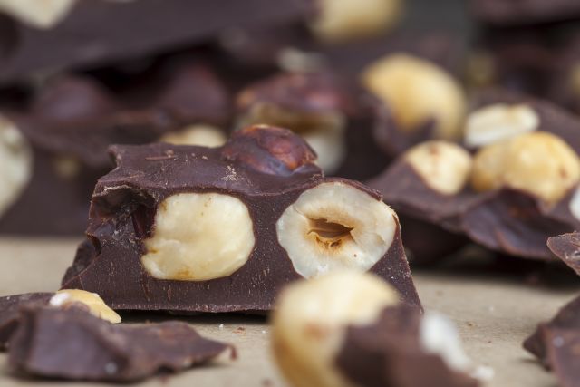 chunks of dark chocolate with macadamia nuts