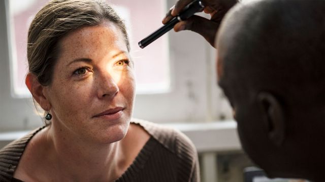 Female patient getting an eye exam