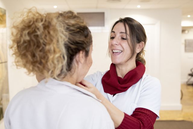 speech therapist working with patient